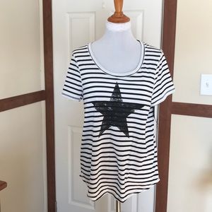 Black/white striped T-shirt with star design. New